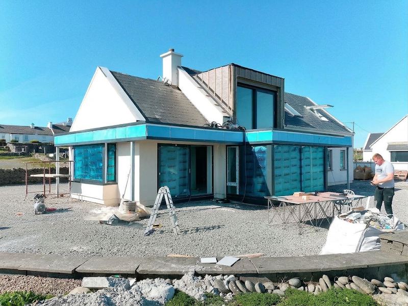 Dormer and single-storey extension under construction with zinc cladding
